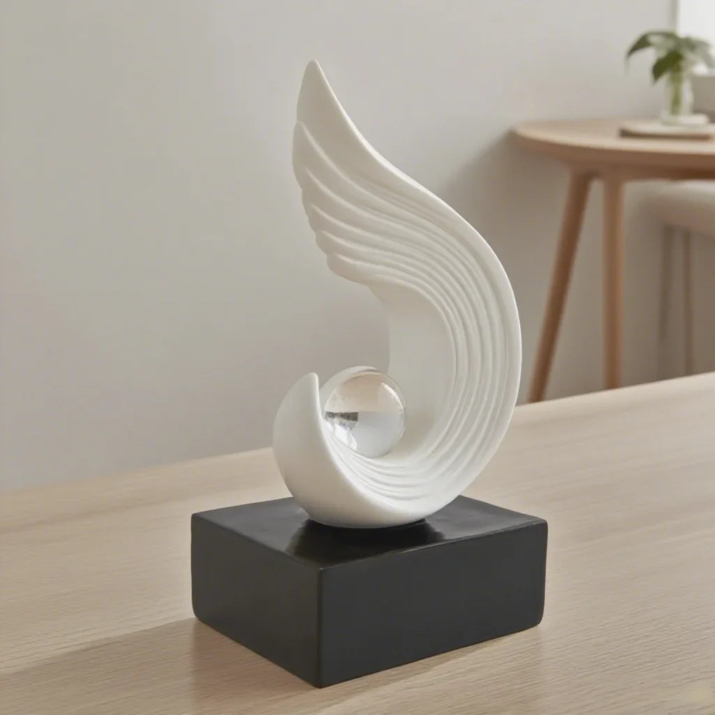 Modern Gold Flame Sculpture with White Sphere Decor Accent
